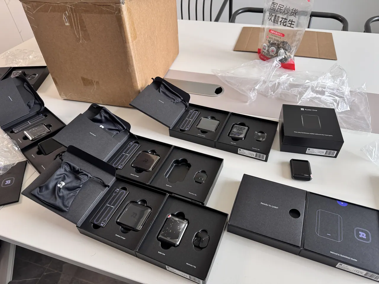 Packaging samples on the review table.
