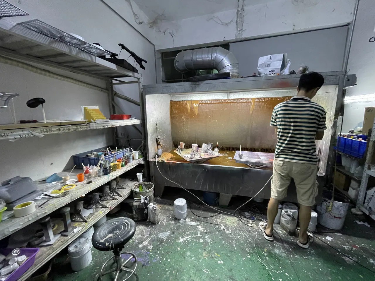 The spray booth.